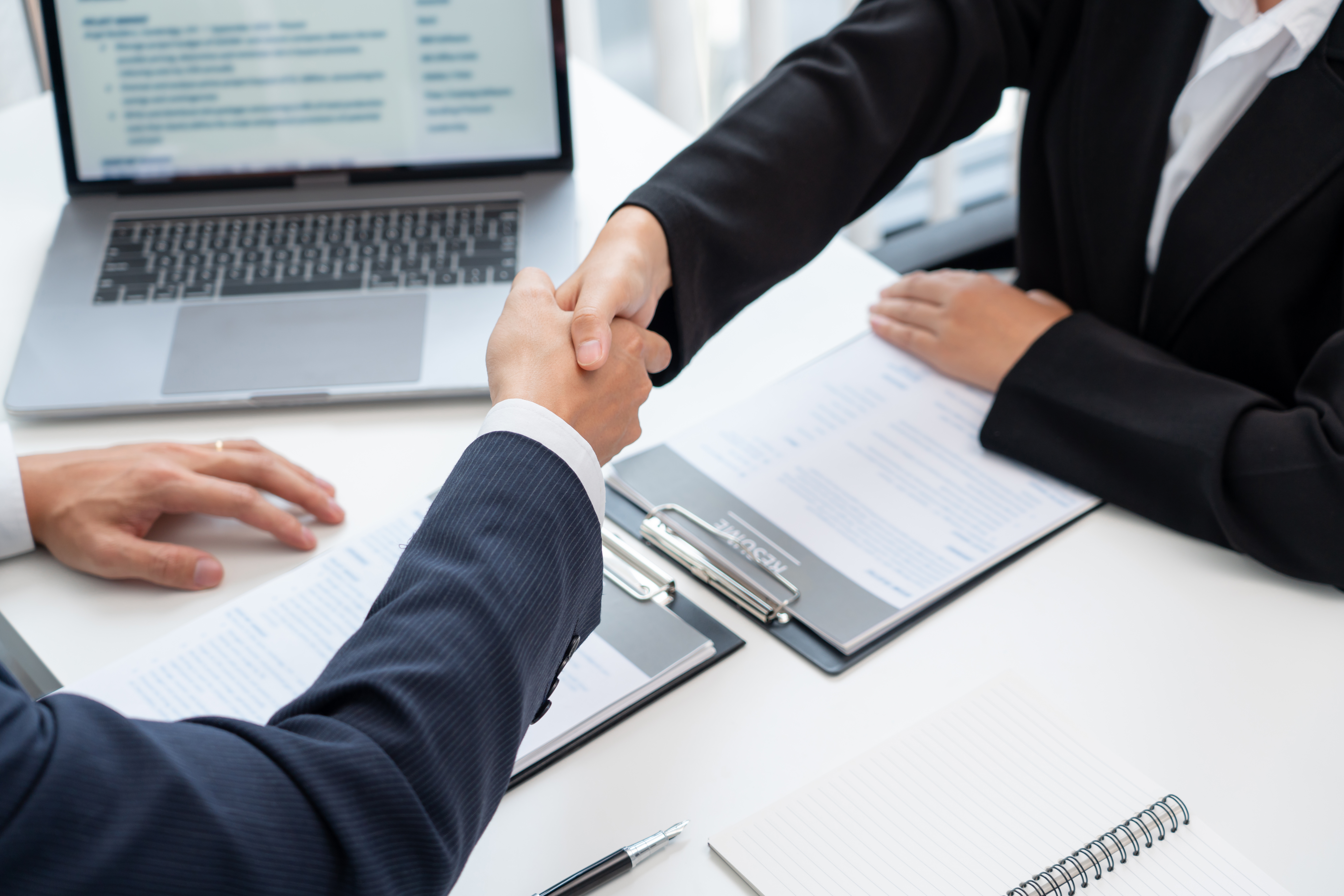 Business professionals collaborating in modern office environment